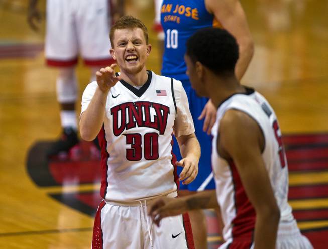 UNLV guard Dantley Walker (30) shares a laugh with teammate UNLV forward Christian Wood (5) during their basketball game versus SJS at the Thomas & Mack Center on Saturday, January 10, 2015. L.E. Baskow.