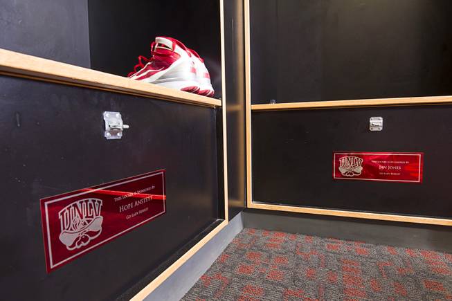 Sponsor plaques are displayed in the Lady Rebels locker room at UNLV Thursday, Jan. 15, 2015. Each players' locker is sponsored by a donor for $2,000  one of the many ways the program is being creative to stay afloat.