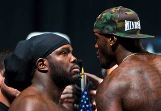 Heavyweight fighter Bermane Stiverne gets face-to-face with his opponent Deontay Wilder during fighter weigh ins within the MGM Grand Arena on Thursday, January 15, 2015.