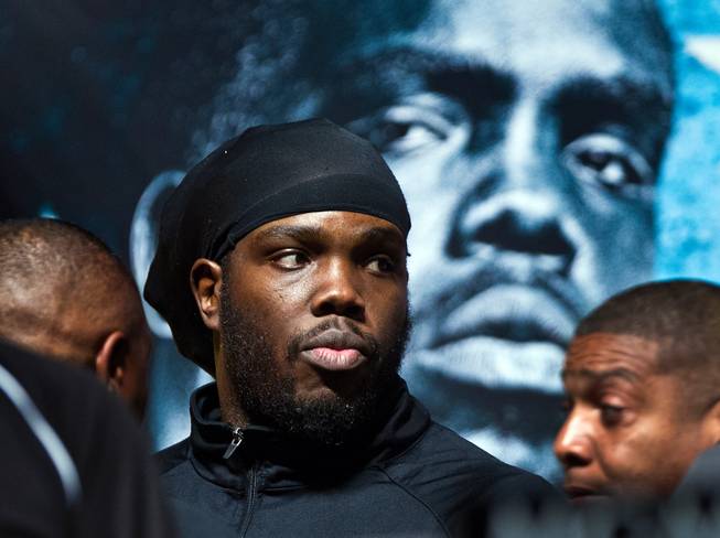 Heavyweight fighter Bermane Stiverne looks to his opponent Deontay Wilder during fighter weigh ins within the MGM Grand Arena on Thursday, January 15, 2015.