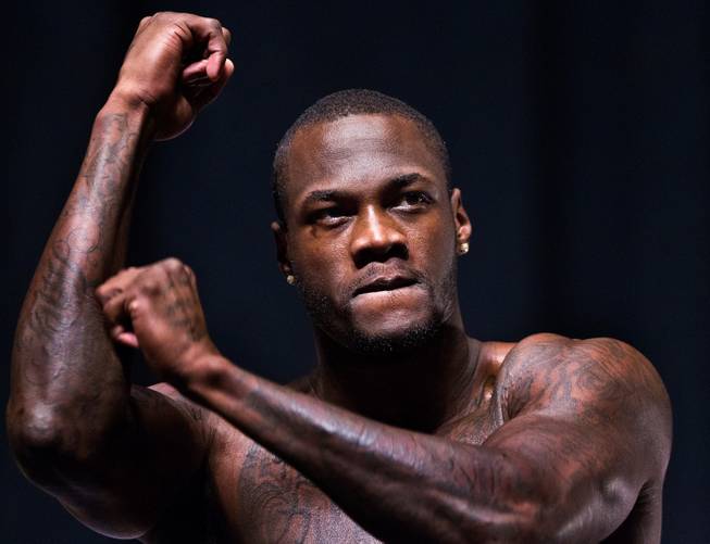 Heavyweight fighter Deontay Wilder poses for the fans on the stage during fighter weigh ins within the MGM Grand Arena on Thursday, January 15, 2015.