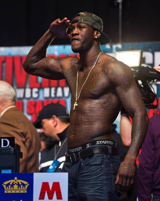 Heavyweight fighter Deontay Wilder salutes the fans on the stage during fighter weigh ins within the MGM Grand Arena on Thursday, January 15, 2015.