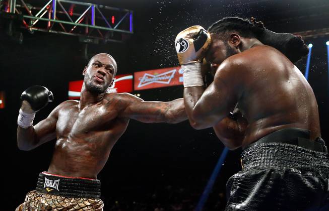 Deontay Wilder connects on Bermane Stiverne during their WBC Heavyweight fight at the MGM Grand Garden Arena on Saturday, January 17, 2015.