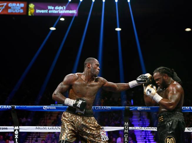 Deontay Wilder connects on Bermane Stiverne during their WBC heavyweight fight Saturday, Jan. 17, 2015, at MGM Grand Garden Arena.