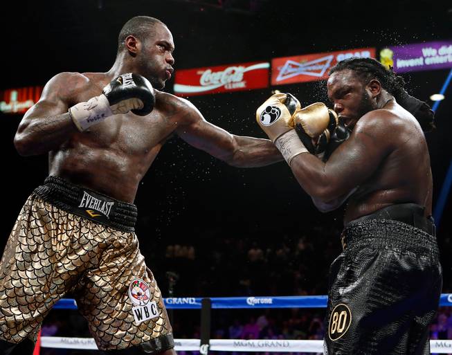 Deontay Wilder connects on the chin of Bermane Stiverne during their WBC Heavyweight fight at the MGM Grand Garden Arena on Saturday, January 17, 2015.