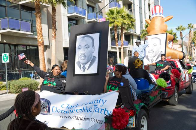 Members of the Clark County Democratic Party participate in the 33rd Annual Dr. Martin Luther King Jr. Parade in downtown Las Vegas, Monday Jan. 19, 2015.