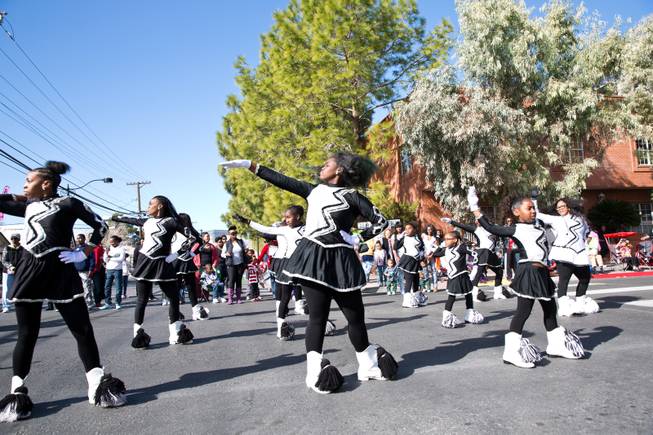 The Pacesetters Drill Team & Drum Squad march in the 33rd Annual Dr. Martin Luther King Jr. Parade in downtown Las Vegas, Monday Jan. 19, 2015.