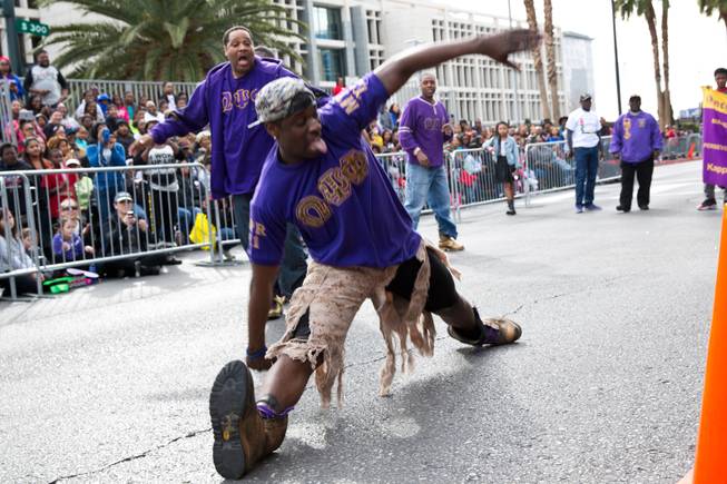 Members of the Kappa Xi, Las Vegas chapter, dance for the crowd during the 33rd Annual Dr. Martin Luther King Jr. Parade in downtown Las Vegas, Monday Jan. 19, 2015.