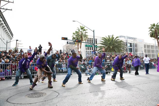 Members of the Kappa Xi, Las Vegas chapter, dance for the crowd during the 33rd Annual Dr. Martin Luther King Jr. Parade in downtown Las Vegas, Monday Jan. 19, 2015.