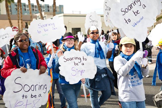 Students from Mabel Hoggard Elementary School march in the 33rd Annual Dr. Martin Luther King Jr. Parade in downtown Las Vegas, Monday Jan. 19, 2015.
