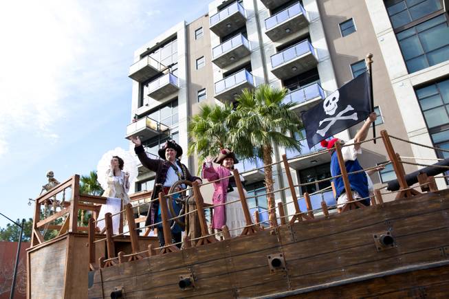 Members of Pirate Fest LV ride a wooden ship down Fourth Street during the 33rd Annual Dr. Martin Luther King Jr. Parade in downtown Las Vegas, Monday Jan. 19, 2015.