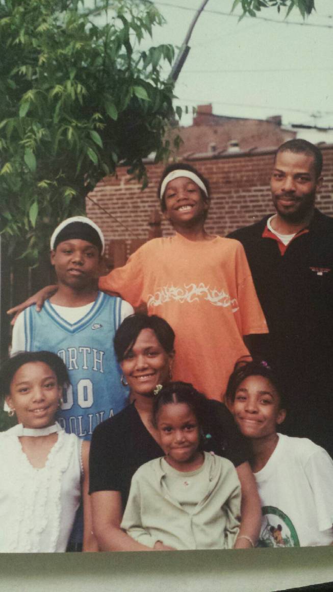 Pat McCaw (middle) was wearing a headband long before he arrived at UNLV, posing here with his parents Jeff Sr. and Teresa, and siblings (clockwise) Celeste, Camille, Jayla and Jeff Jr. Pat McCaw's youngest sister, Trinity, is not pictured.