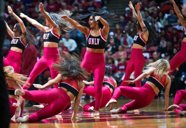 The UNLV Rebel Girls perform for the crowd during their game at the Thomas & Mack Center on Wednesday, January 21, 2015.