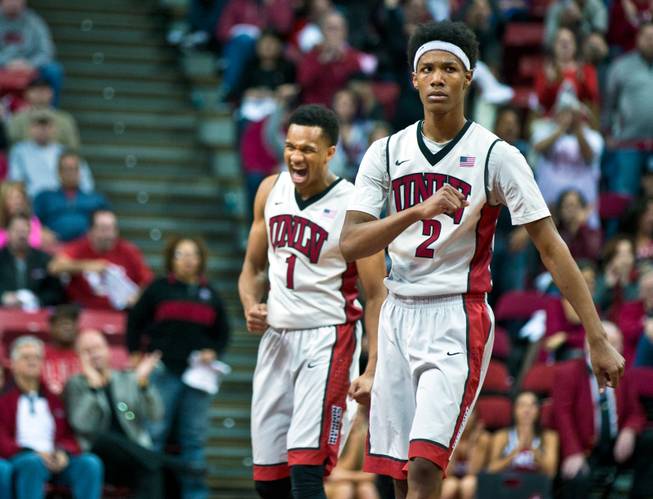 UNLV guard Rashad Vaughn (1) and UNLV guard Patrick McCaw (2) are excited as the score is tied up during their game with New Mexico at the Thomas & Mack Center on Wednesday, January 21, 2015.