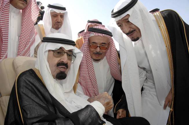 In this Monday, Nov. 22, 2010, file photo released by the Saudi Press Agency, Saudi Arabia's King Abdullah, left, speaks with Prince Salman, the Saudi King's brother and Riyadh governor, right, before the king's departure to United States, in Riyadh, Saudi Arabia. On early Friday, Jan. 23, 2015, Saudi state TV reported King Abdullah died at the age of 90.