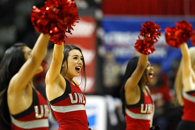 UNLV cheerleaders perform as the Rebels play Utah State at the Thomas & Mack Center Saturday, Jan. 24, 2015.