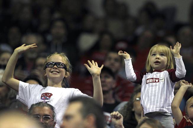 UNLV fans cheer on the Rebels as they take on Utah State at the Thomas & Mack Center Saturday, Jan. 24, 2015.