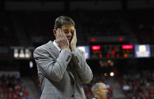 UNLV Head Coach Dave Rice reacts to a play as the Rebels take on against Utah State at the Thomas & Mack Center Saturday, Jan. 24, 2015.