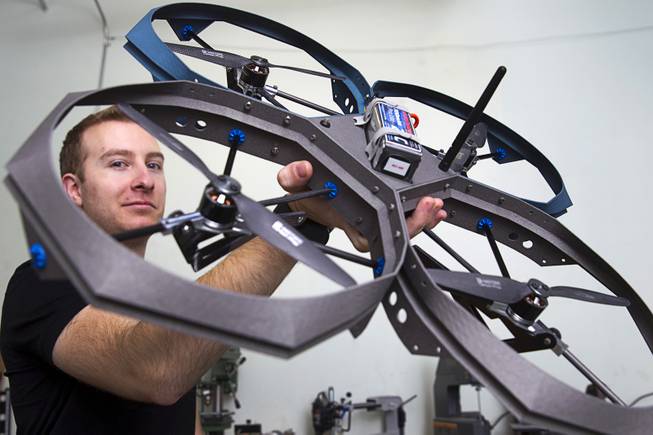 Greg Friesmuth, CEO/founder, displays the Qua.R.K.  (Quad Rotor Research Kit) drone at SkyWorks, a company producing research drones, in Henderson Monday, Jan. 26, 2015.