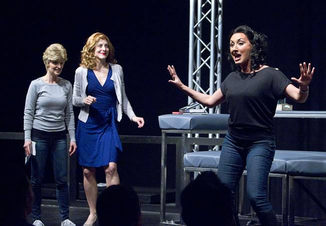 Chelsea Phillips-Reid (Pam) sings in a rehearsal for “50 Shades! The Parody” as Sabrina Plaisance Sia (Carol), left, and Zipporah Peddle (Bev) watch at Windows Theater on Wednesday, Jan. 28, 2015, at Bally’s. The show opens on Feb. 3.

