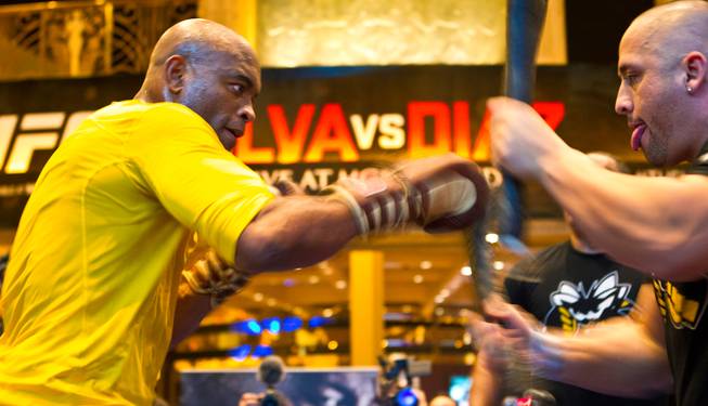 UFC 183 fighter Anderson Silva readies to make a strike during 'workouts' open to the public at the MGM Grand Casino floor on Wednesday, January 28, 2015.