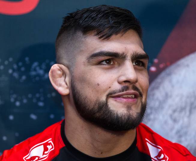 UFC welterweight contender Kelvin Gastelum answers a question during the UFC183 media day event on Thursday, January 29, 2015.
