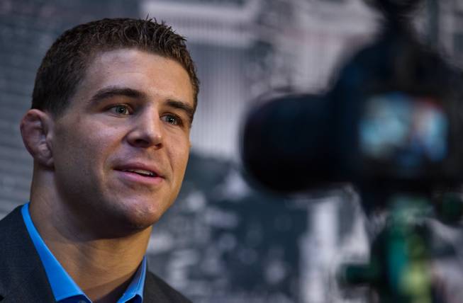 UFC lightweight Al Iaquinta answers a question during the UFC183 media day event on Thursday, January 29, 2015.