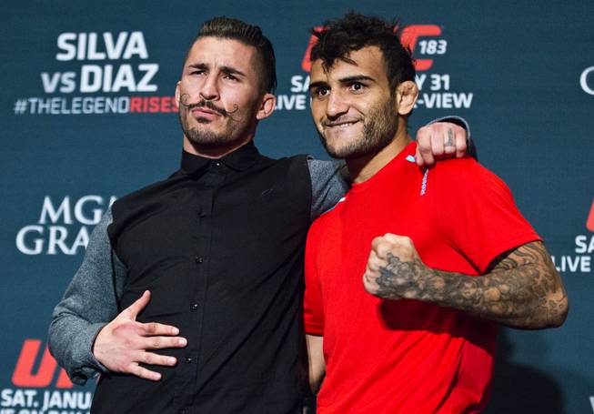 UFC flyweight contender Ian McCall poses with John Lineker during the UFC183 media day event on Thursday, January 29, 2015.