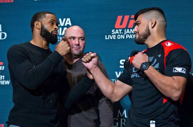 UFC welterweight contender Tyron Woodley faces off with Kelvin Gastelum during the UFC183 media day event on Thursday, January 29, 2015.