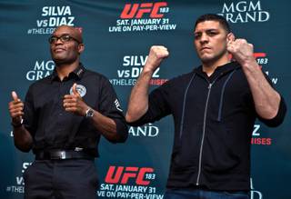 The UFC183 fighters Anderson Silva and Nick Diaz pose for the crowd during media day events at the MGM Grand on Thursday, January 29, 2015.