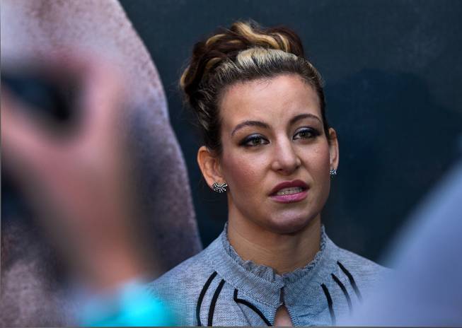 UFC womens bantamweight contender Miesha Tate considers a question during the UFC183 media day event on Thursday, January 29, 2015.