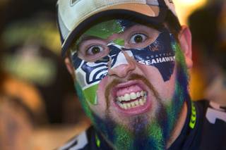 David Macias-Clark of Henderson shows his Seahawk loyalty as he watches the Super Bowl at Scooter's Pub, 6200 South Rainbow Blvd., Sunday, Feb.1, 2015.