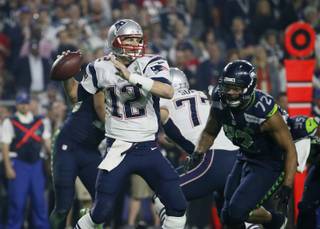 New England Patriots quarterback Tom Brady throws a pass during the second half of Super Bowl XLIX against the Seattle Seahawks on Sunday, Feb. 1, 2015, in Glendale, Ariz.