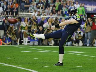 Seattle Seahawks wide receiver David Gilreath (6) punts the ball during the first half of Super Bowl XLIX on Sunday, Feb. 1, 2015, in Glendale, Ariz. 