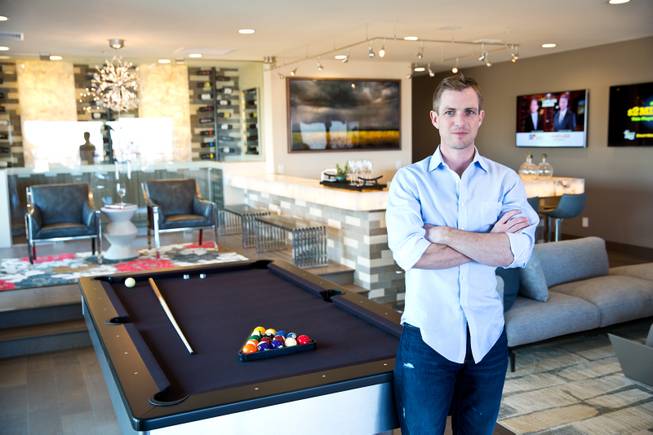 Tyler Jones, co-founder and lead designer of Blue Heron, is shown Jan. 16, 2015, in the model home at Sky Terrace, one of three luxury-home communities being developed by the company in Henderson.