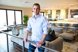 Tyler Jones, co-founder and lead designer of Blue Heron, is shown Jan. 16, 2015, in the model home at Sky Terrace, one of three luxury-home communities being developed by the company in Henderson.