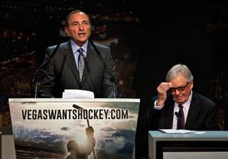 Gary Bettman, commissioner of the NHL, addresses the crowd as Bill Foley, chairman of Fidelity National Financial Inc., Black Knight and FIS, listens during the “Let’s Bring Hockey to Las Vegas!” press conference Tuesday, Feb. 10, 2015, at MGM Grand Ballroom.