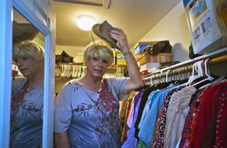 Holly Nesmith shows off some of her clothes collection at home on Tuesday, January 27, 2015. L.E. Baskow