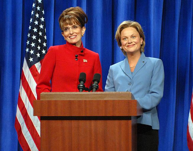 In this Sept. 13, 2008, photo, Tina Fey portrays Alaska Gov. Sarah Palin and Amy Poehler is Sen. Hillary Clinton during a skit on "Saturday Night Live" in New York. The long-running sketch comedy series will celebrate its 40th anniversary with a 3 1/2-hour special airing Sunday on NBC.
