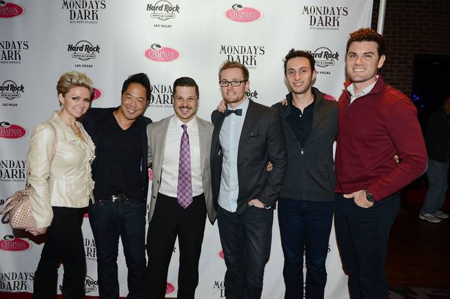 Host Mark Shunock, third from left, and guests arrive at ...