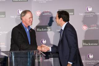 D. Taylor, President of UNITE HERE, shakes hands with Jonathan Gray, of Blackstone, during an event celebrating The Cosmopolitan of Las Vegas' new ownership by Blackstone, Wed. Feb 18, 2015.