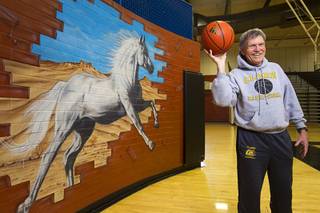 David Svendsen, 75, a Clark High School basketball coach, poses during practice at the school Monday, Feb. 23, 2015. The defending state champs play Lowry High School (Winnemucca) in the Division 1A state semifinals at Silverado at 8 p.m. Friday.