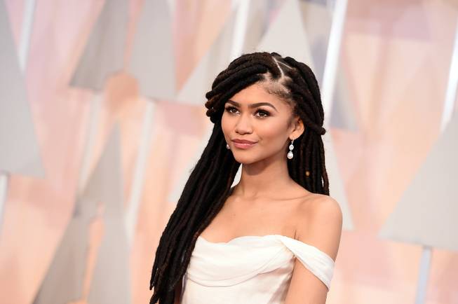 Zendaya arrives at the Oscars on Sunday, Feb. 22, 2015, at the Dolby Theatre in Los Angeles. 