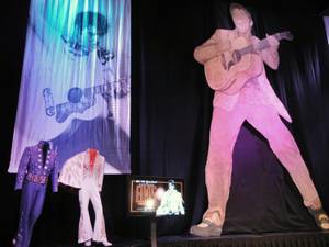 This Wednesday, Feb. 25, 2015, photo shows simple and bedazzled suits once worn by Elvis, many while performing onstage in Las Vegas, displayed at the Westgate Las Vegas, originally the International Hotel in Las Vegas.
