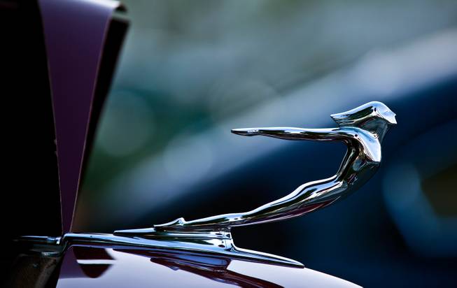 A decorative hood ornament from a 1936 Cadillac Series 85 Formal Sedan is one of many of Jim Rogers classic cars now on the auction block handled by Mecum Auctions at the Rogers' Classic Car Museum on Friday, February, 27, 2015.