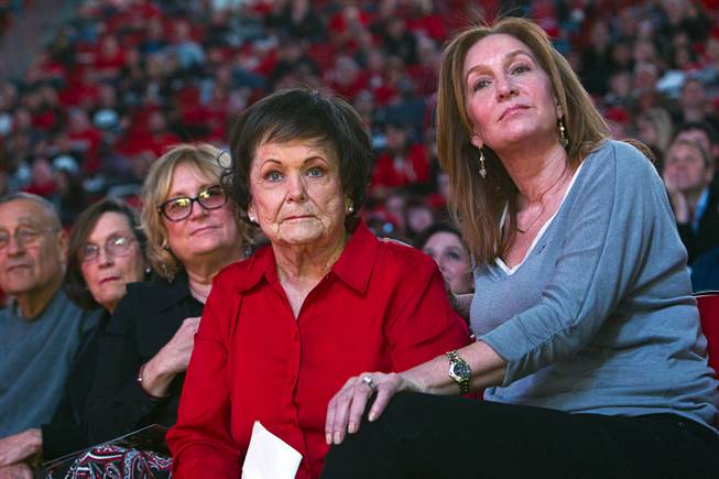 Lois Tarkanian, center, listens to former NBA player Chris Herren speak about her late husband during a tribute to celebrate the life of former UNLV coach Jerry Tarkanian at the Thomas & Mack Center Sunday, March 1, 2015. With Lois Tarkanian are her daughters Pamela Tarkanian, left, and Jodie Diamant. Jerry Tarkanian died died Feb. 11 at age 84.