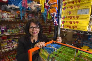 Owner Christy Delcid poses in Christy's Candy Shop at the Boulevard Mall Sunday, March 1, 2015.