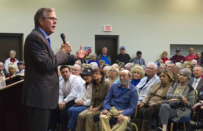 Former Florida Gov. Jeb Bush responds to a question during question and answer session at the Mountain Shadows Community Center in Las Vegas Monday, March 2, 2015. S