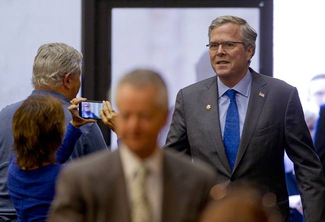Former Florida Gov. Jeb Bush arrives a question and answer session at the Mountain Shadows Community Center in Las Vegas Monday, March 2, 2015.