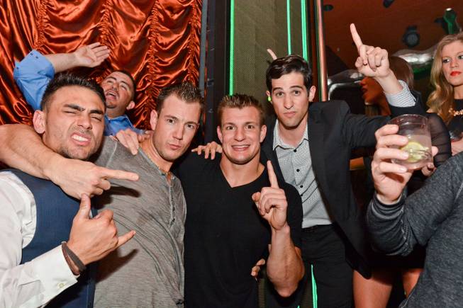 New England Patriots tight end Rob Gronkowski, center, parties at ...